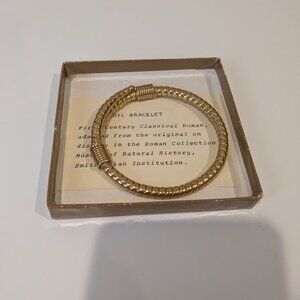 Vintage coil bracelet, golden costume jewelry, beautiful bangle bracelet